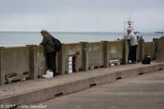 Some men, fishing I think, on the old pier.